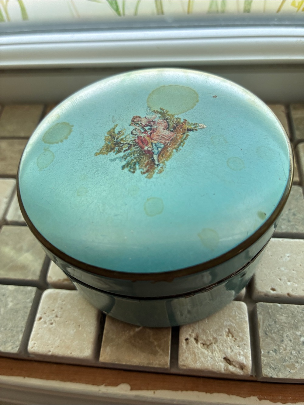 Vintage face powder tin
